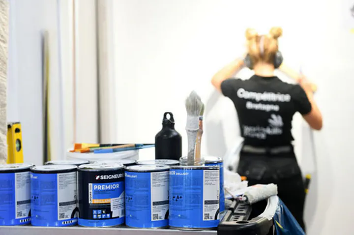 Competiteur de la competition WorldSkills photographie en situation de travail lors d un reportage evenementiel a Eurexpo Lyon