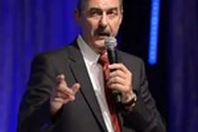 Evenement professionnel en salle pleniere photographié en reportage evenementiel a Lyon