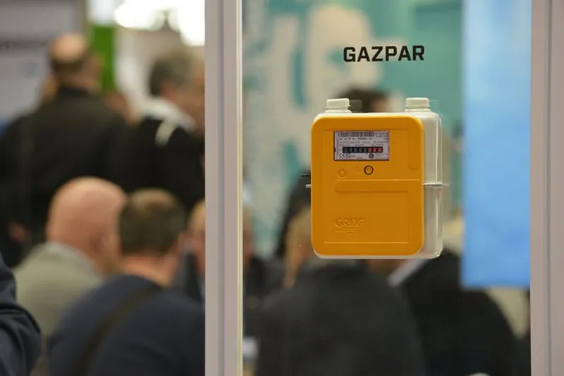 Discussion professionnelle entre Diehl Metering et des partenaires au salon Pollutec